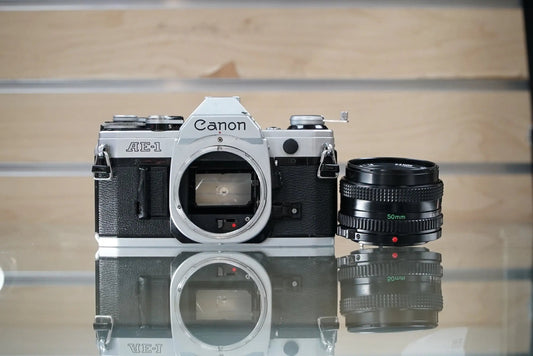Canon (11723) AE-1 35mm Film SLR Camera w/FD 50mm f1.8 S.C. Lens, Used