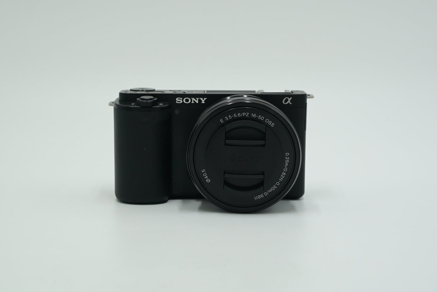 Sony ZVE10L/B/6231368 Mirrorless Camera W/16-50mm Lens + Neewer Cage, Black, Used
