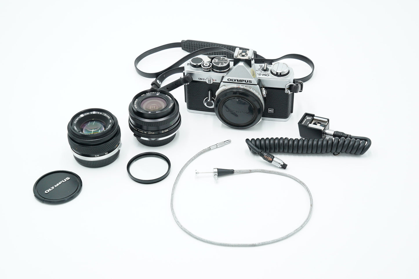 Olympus OM2N/95712 OM-2n Film Camera + Zuiko 50mm f/1.8 Lens + Vivitar 28mm f/2.8 + Shutter Release Cable, Used