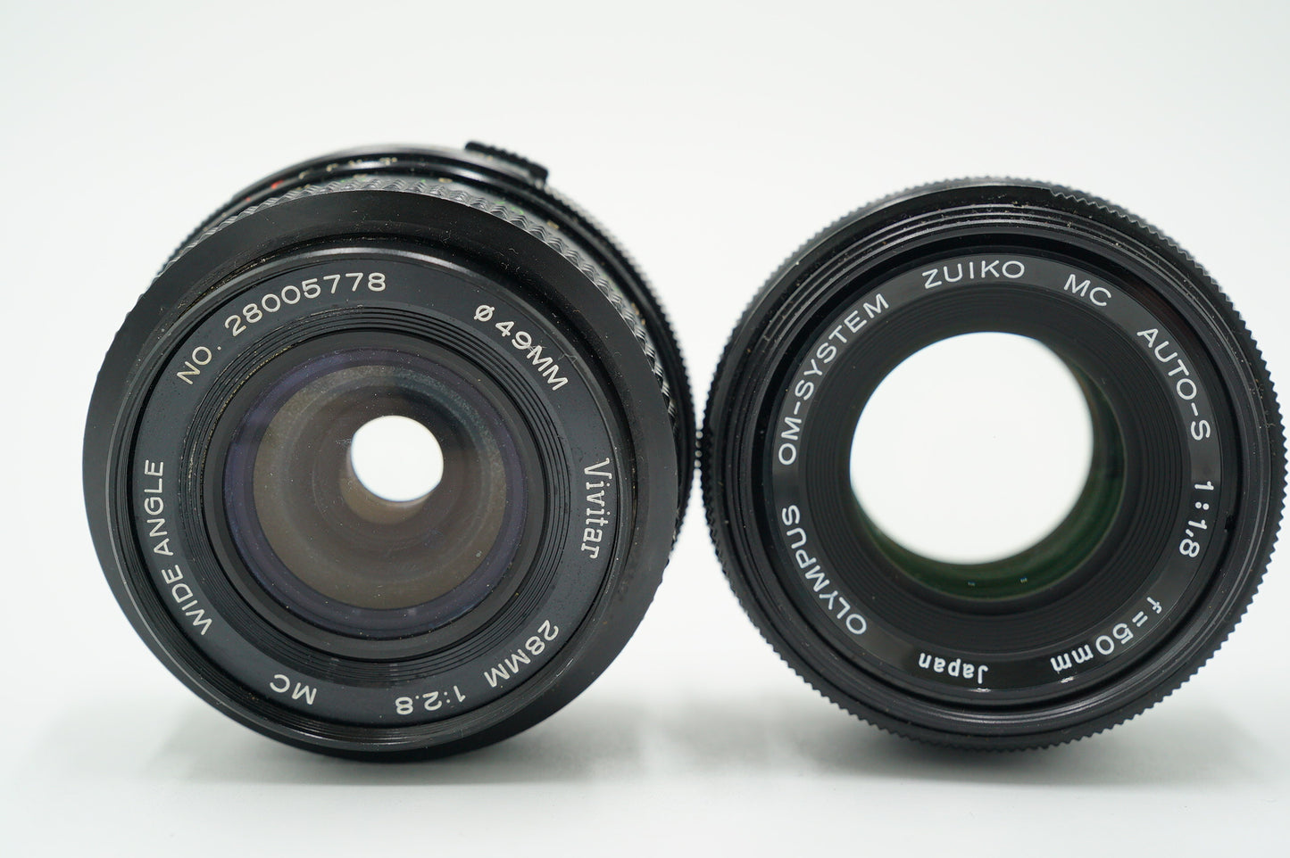 Olympus OM2N/95712 OM-2n Film Camera + Zuiko 50mm f/1.8 Lens + Vivitar 28mm f/2.8 + Shutter Release Cable, Used