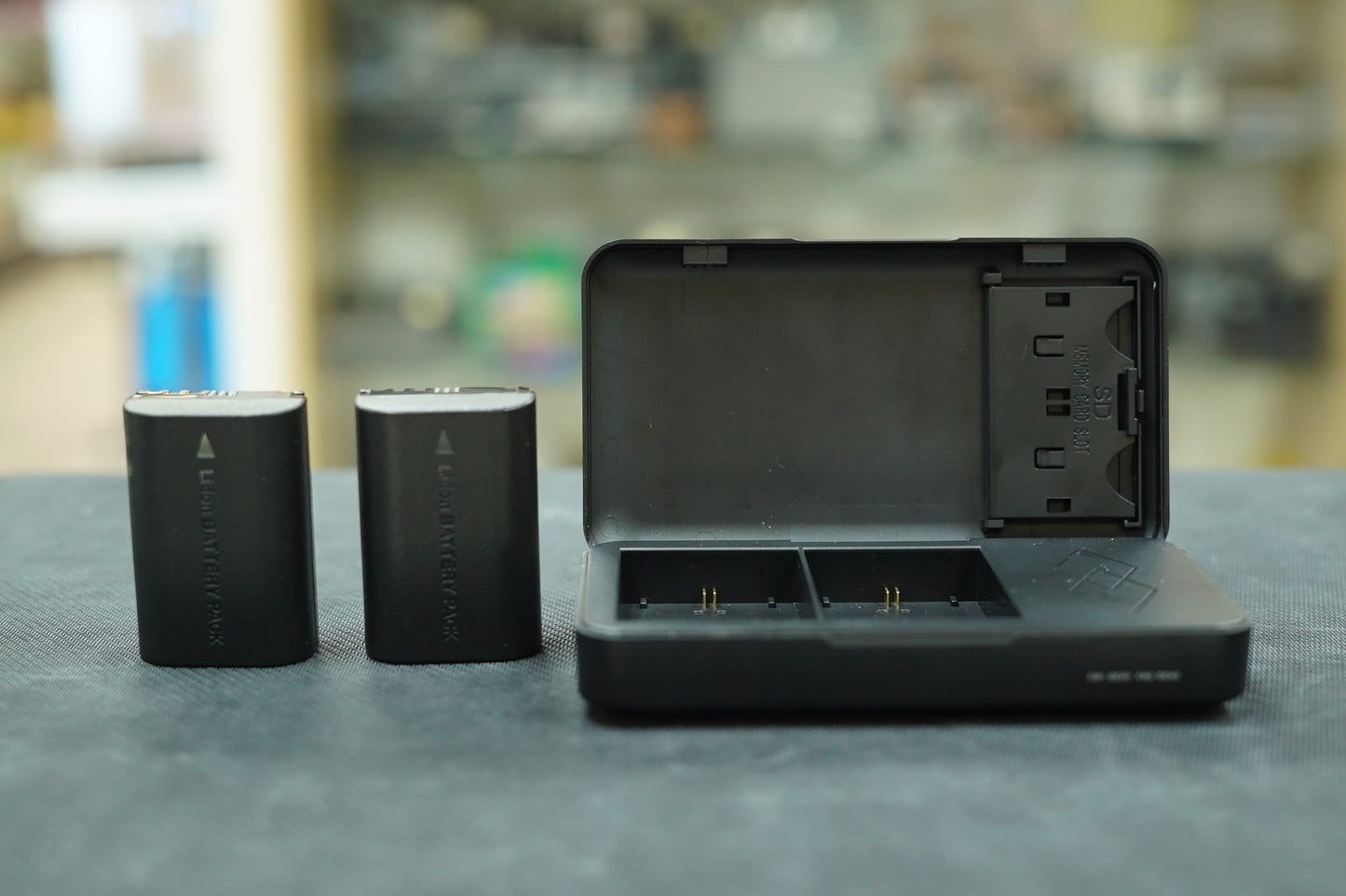 Ojelay DB-LPE6 Charger & Powerbank, Used