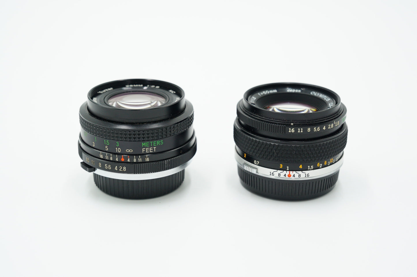 Olympus OM2N/95712 OM-2n Film Camera + Zuiko 50mm f/1.8 Lens + Vivitar 28mm f/2.8 + Shutter Release Cable, Used