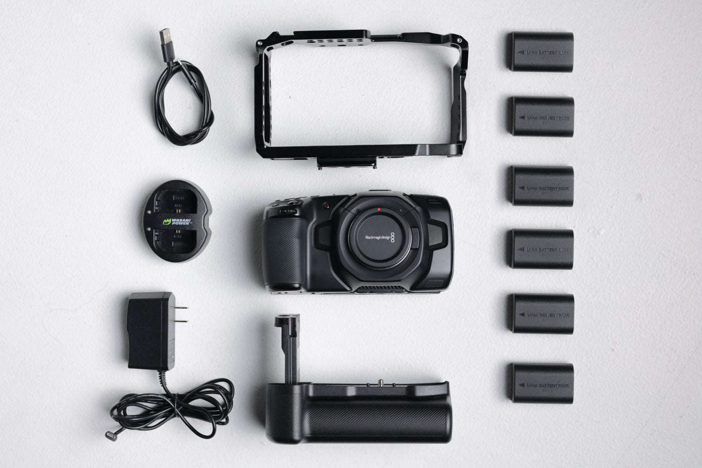 Blackmagic CINEMA4K/02708 Pocket Cinema 4K + Neewer Battery Grip + Dual Charger + Smallrig Cage, Used