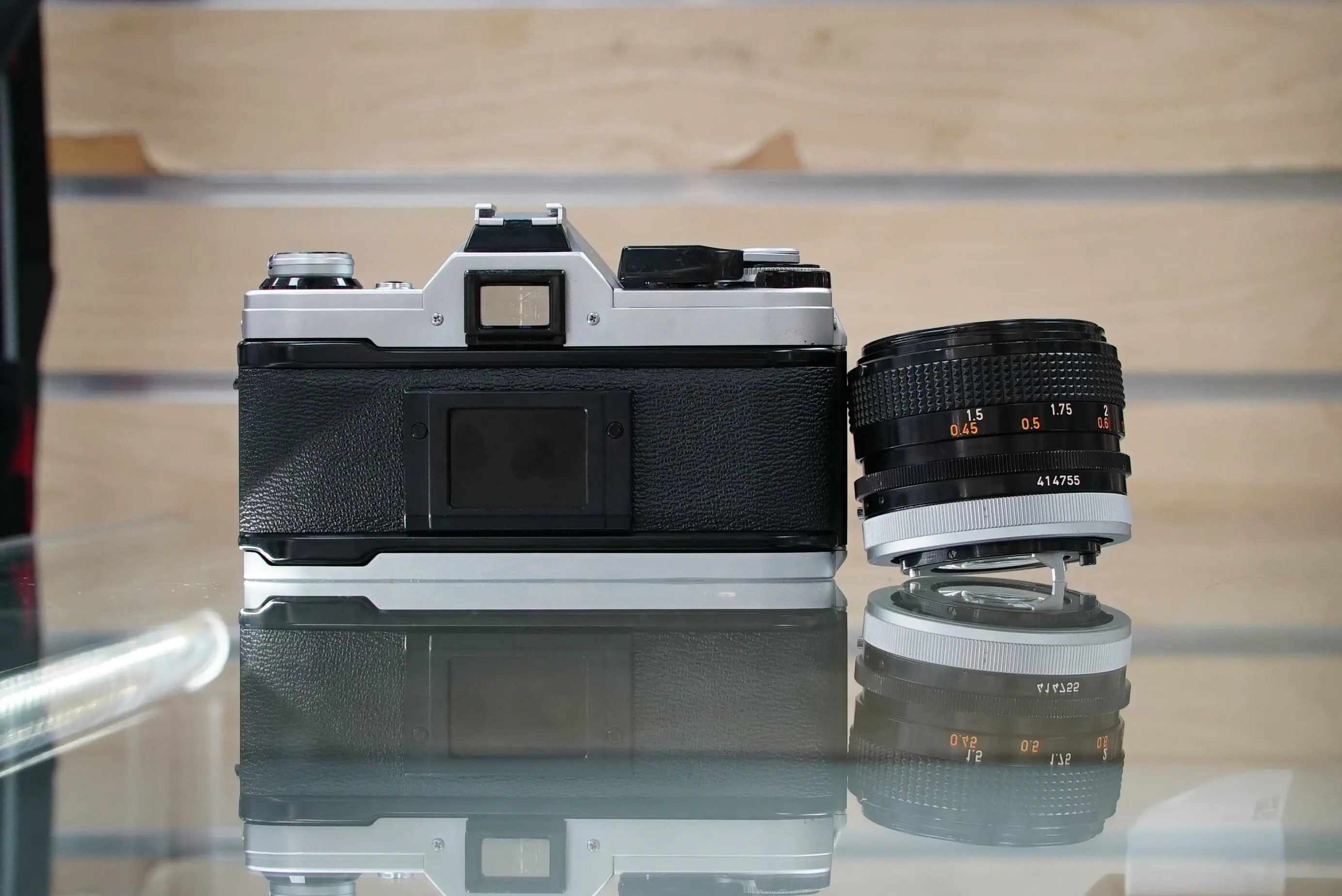 Canon (12229) AE-1 35mm Film SLR Camera w/FD 50mm f1.4 S.S.C. Lens, Used (Renewed)