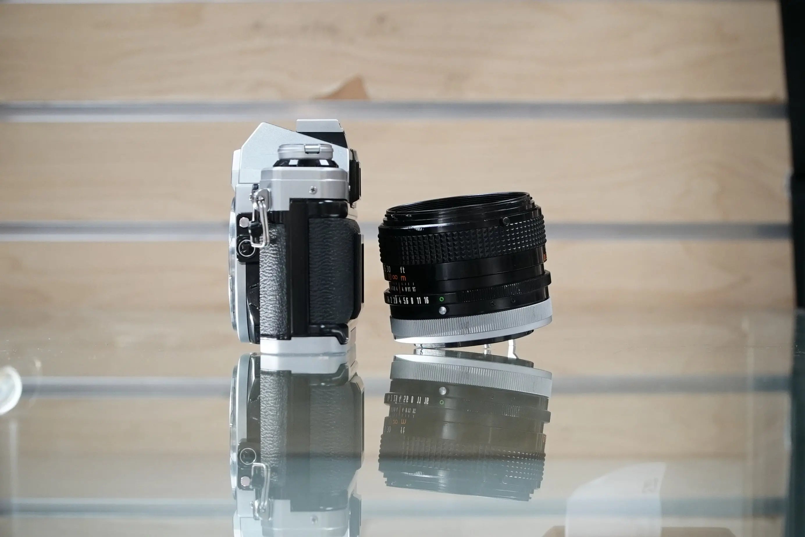Canon (12229) AE-1 35mm Film SLR Camera w/FD 50mm f1.4 S.S.C. Lens, Used (Renewed)