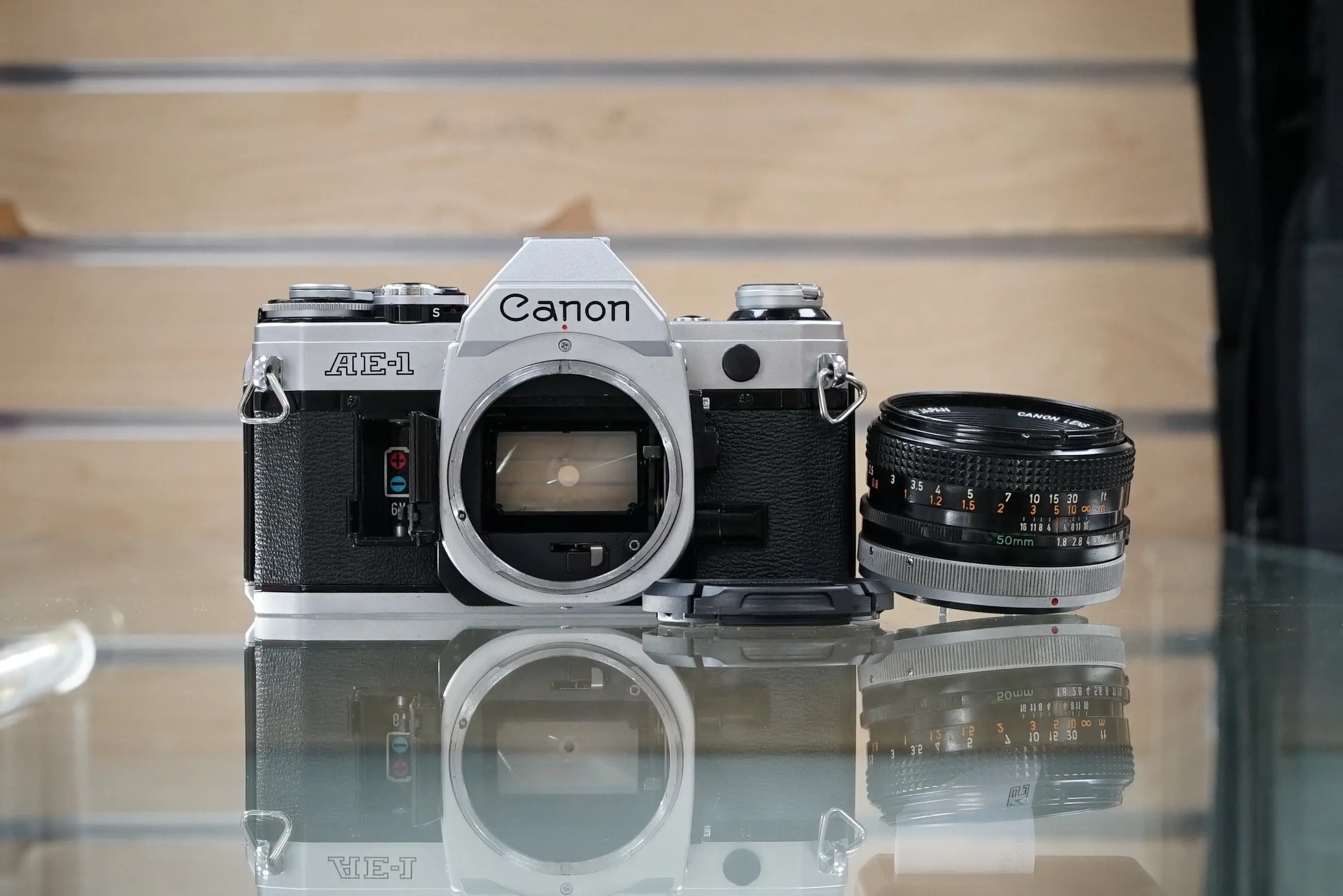 Canon (08640) AE-1 35mm Film SLR Camera w/FD 50mm f1.8 S.C. Lens, Used