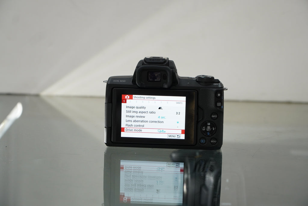 Canon EOS M50 Mirrorless Camera with 15-45mm Lens + Fotodiox pro EF to EOS M Adapter #03932, Used