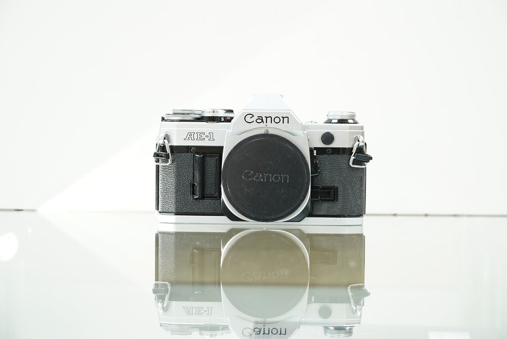 Canon (12229) AE-1 35mm Film SLR Camera w/FD 50mm f1.4 S.S.C. Lens, Used (Renewed)