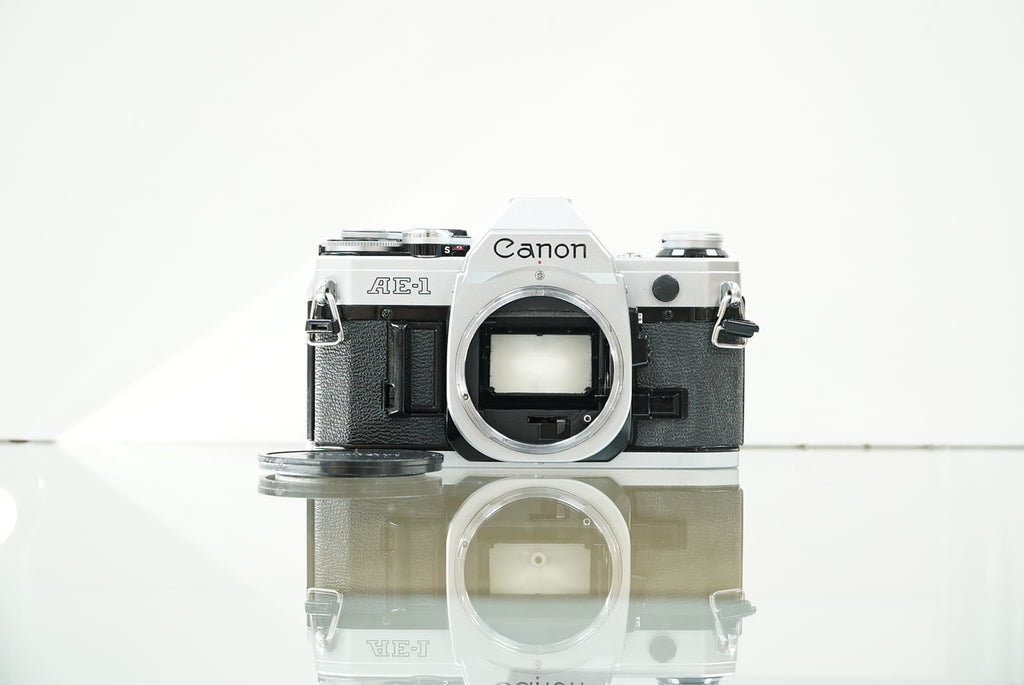 Canon (12229) AE-1 35mm Film SLR Camera w/FD 50mm f1.4 S.S.C. Lens, Used (Renewed)