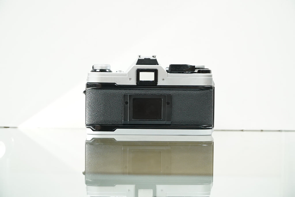 Canon (12229) AE-1 35mm Film SLR Camera w/FD 50mm f1.4 S.S.C. Lens, Used (Renewed)
