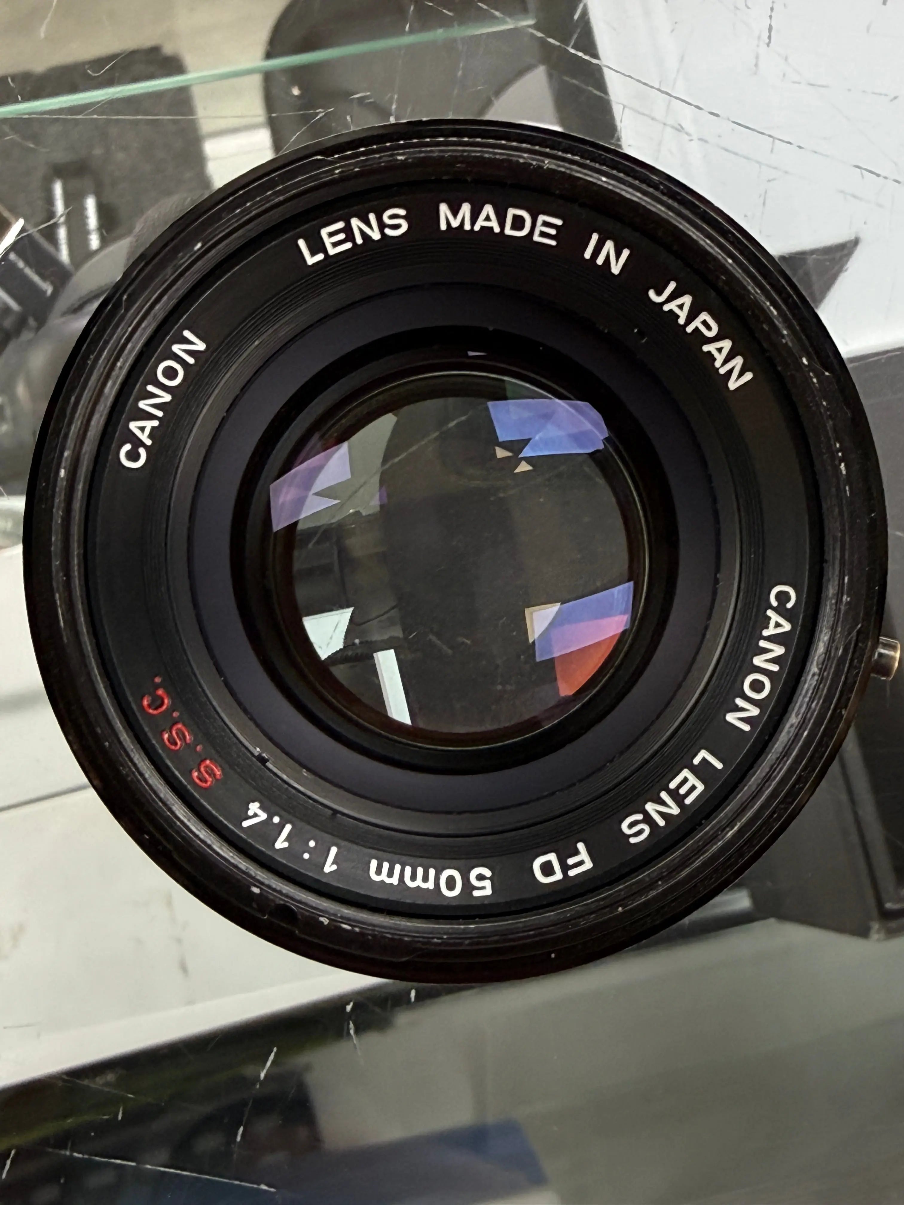 Canon AE1-50F14-16564 AE-1 35mm Film Camera (Black) W/FD 50mm f/1.4 S.S.C. Lens, Used CANON