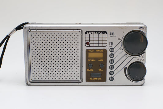 Lifelong AM/ FM LCD Alarm Clock Model 845 (Silver), Used - AVC photo video store