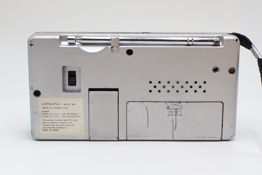 Lifelong AM/ FM LCD Alarm Clock Model 845 (Silver), Used - AVC photo video store