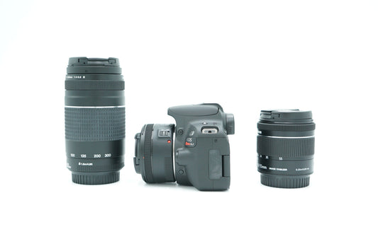 Canon EOSREBELSL2/04965 REBEL SL2 + EF-S 18-55mm + EF 50mm + EF 75-30mm, Used